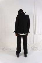 Comme des Garçons Homme Plus S/S 2012 destroyed pockets jacket – close-up | Recente Studio