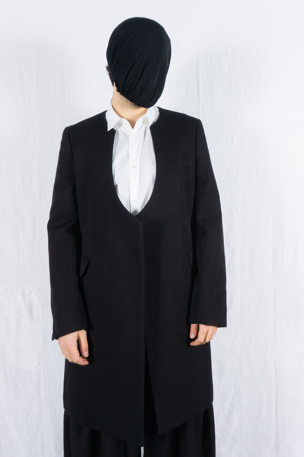 Comme des Garçons Homme Plus A/W 2022 collarless coat – front view | Recente Studio