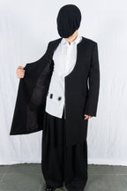 Comme des Garçons Homme Plus AW22 collarless coat – back view | Recente Studio