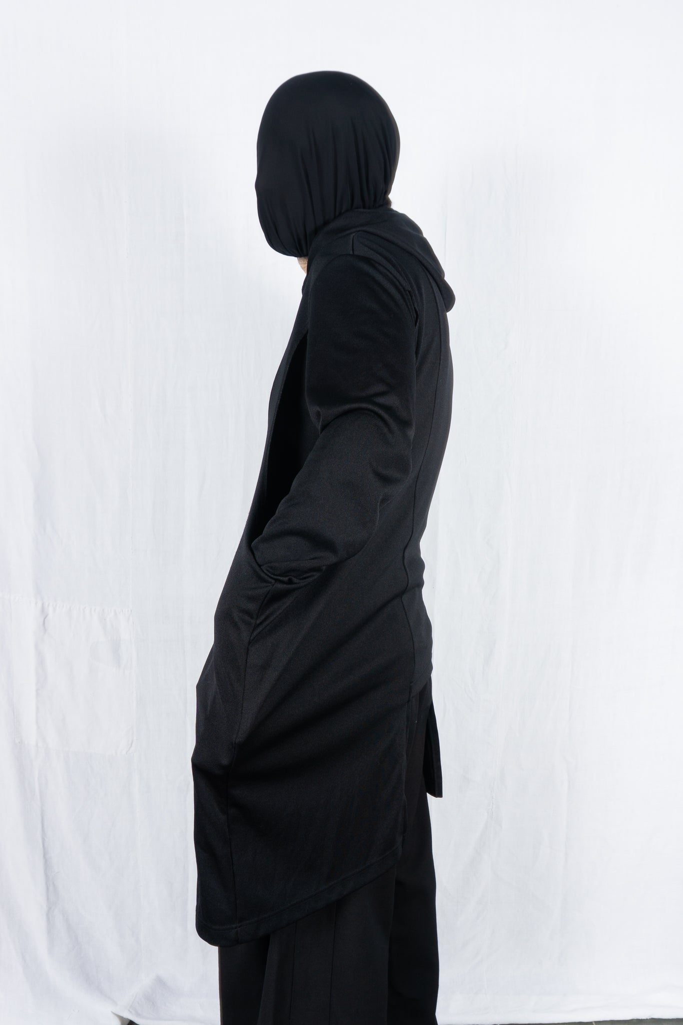 Comme des Garçons Homme Plus AW21 asymmetric hoodie – detail | Recente Studio