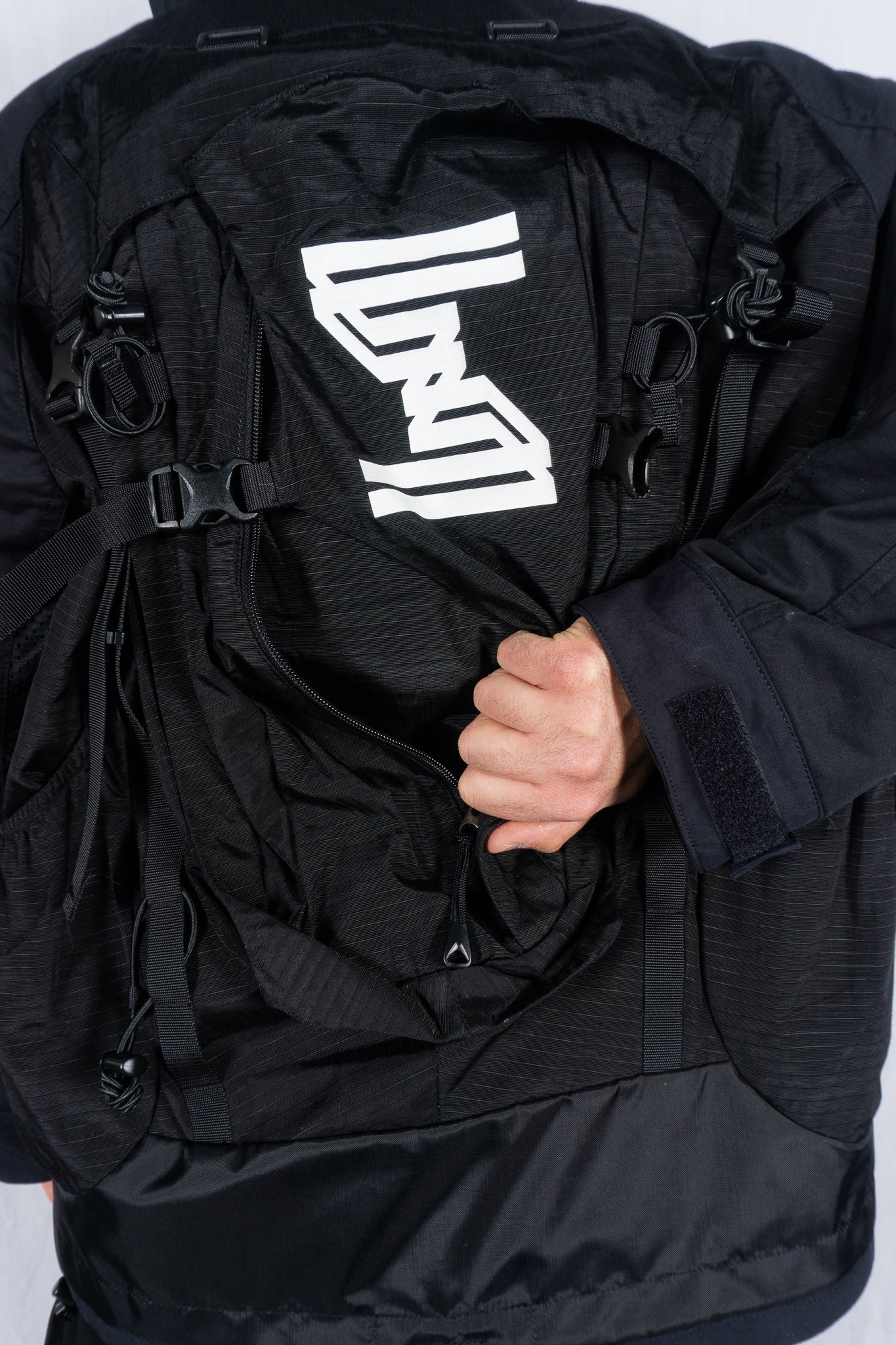 Junya Watanabe Man A/W 2023 hybrid backpack jacket – strap detail | Recente Studio