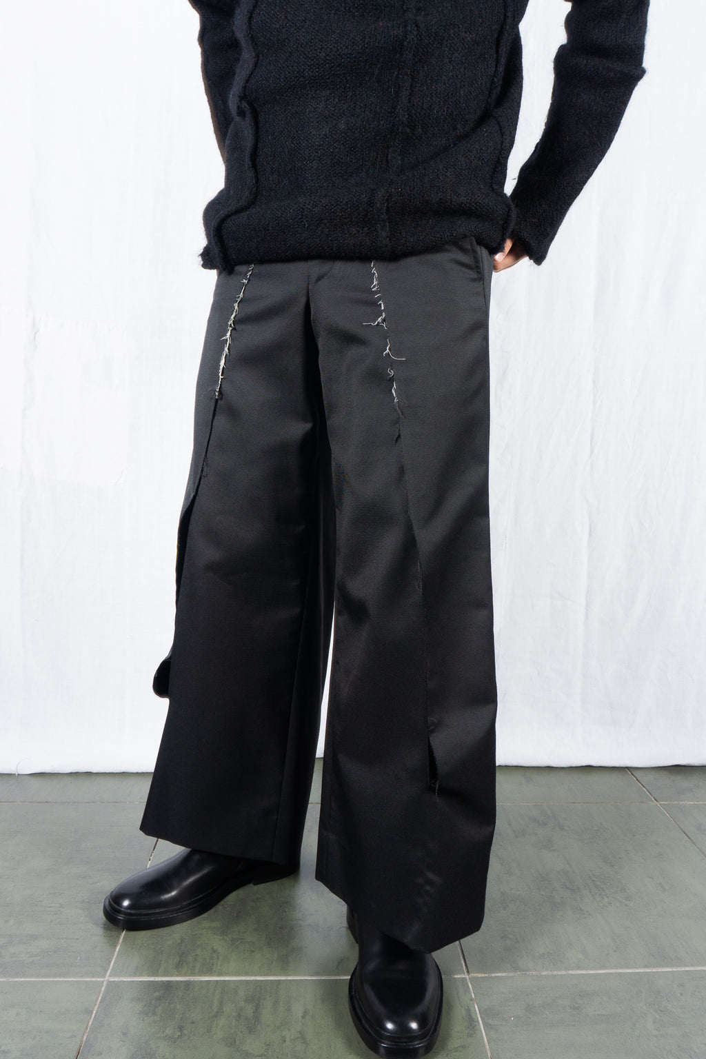 Comme des Garçons Homme Plus A/W 2024 deconstructed pants – side view | Recente Studio