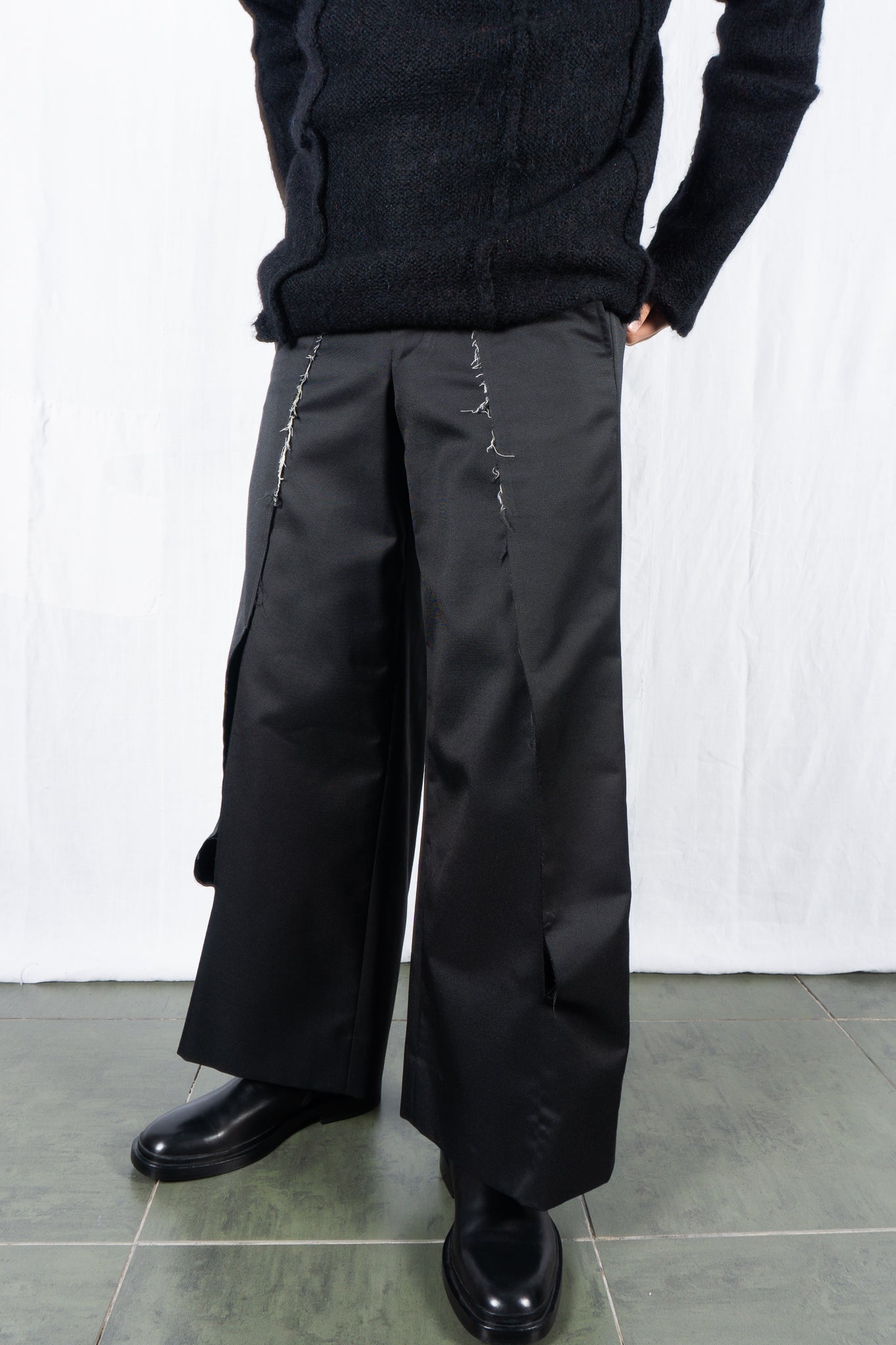 Comme des Garçons Homme Plus A/W 2024 deconstructed pants – side view | Recente Studio