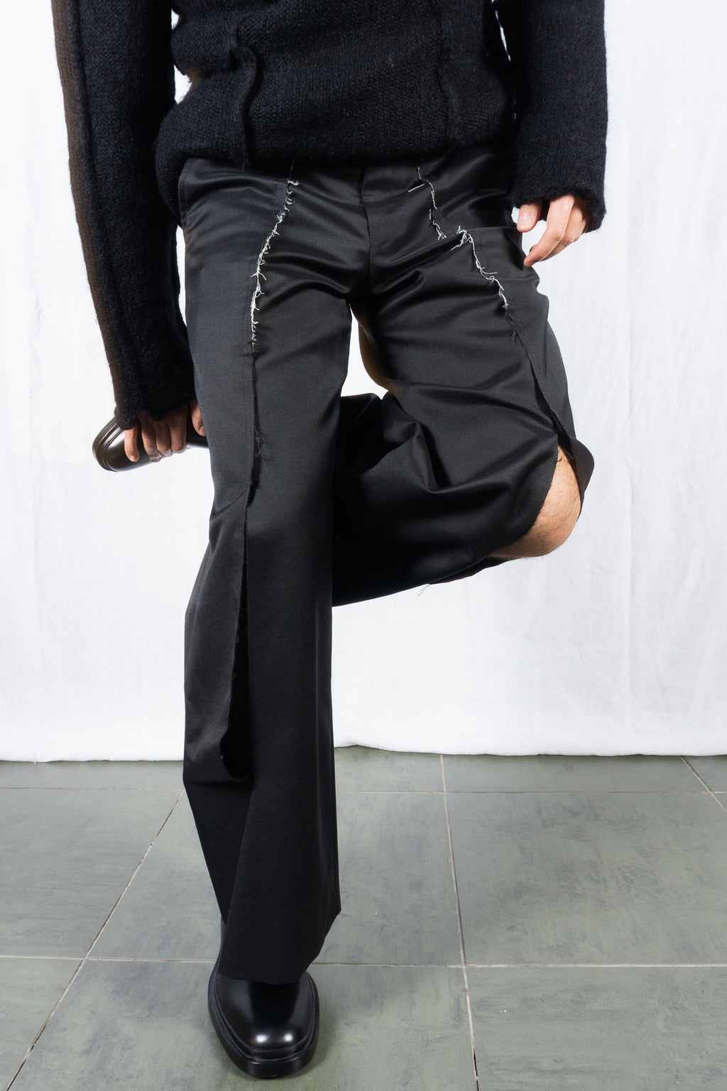 Comme des Garçons Homme Plus A/W 2024 deconstructed pants – front view | Recente Studio