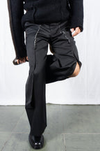 Comme des Garçons Homme Plus A/W 2024 deconstructed pants – front view | Recente Studio