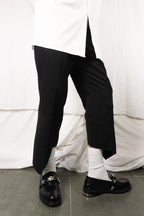 Comme des Garçons Homme Plus SS19 spiral pants – side view | Recente Studio