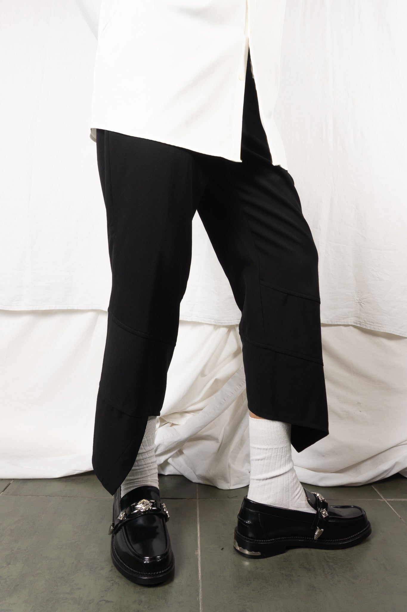 Comme des Garçons Homme Plus SS19 spiral pants – side view | Recente Studio