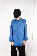 Comme des Garçons SHIRT S/S 2021 x Yue Minjun nylon jacket – back view | Recente Studio