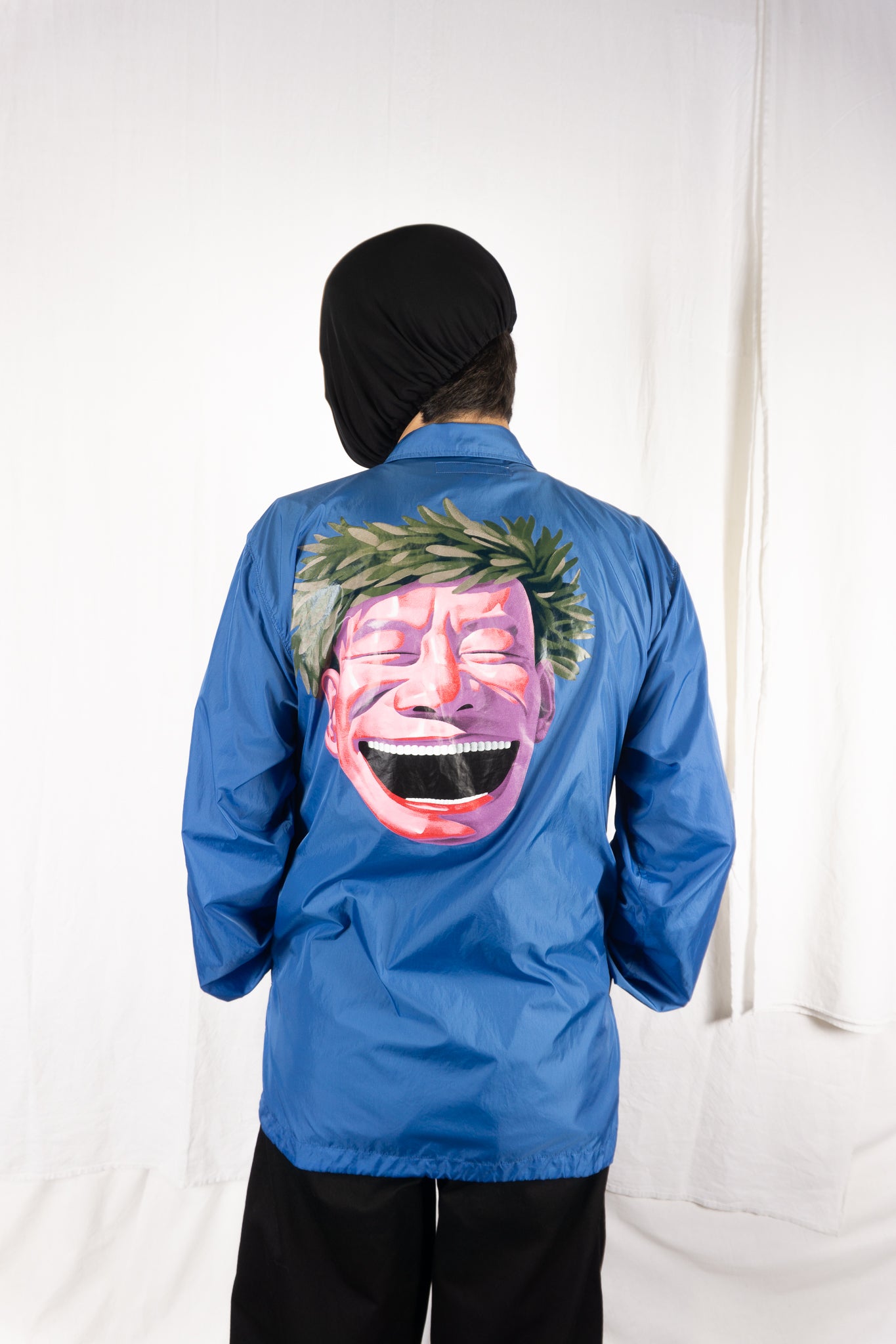 Comme des Garçons SHIRT S/S 2021 x Yue Minjun nylon jacket – front view | Recente Studio