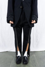 Noir Kei Ninomiya A/W 2022 zip pants – back view | Recente Studio