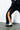 Noir Kei Ninomiya A/W 2022 zip pants – worn view | Recente Studio