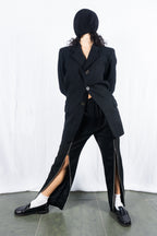 Noir Kei Ninomiya A/W 2022 zip pants – front view | Recente Studio