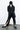 Noir Kei Ninomiya A/W 2022 zip pants – front view | Recente Studio