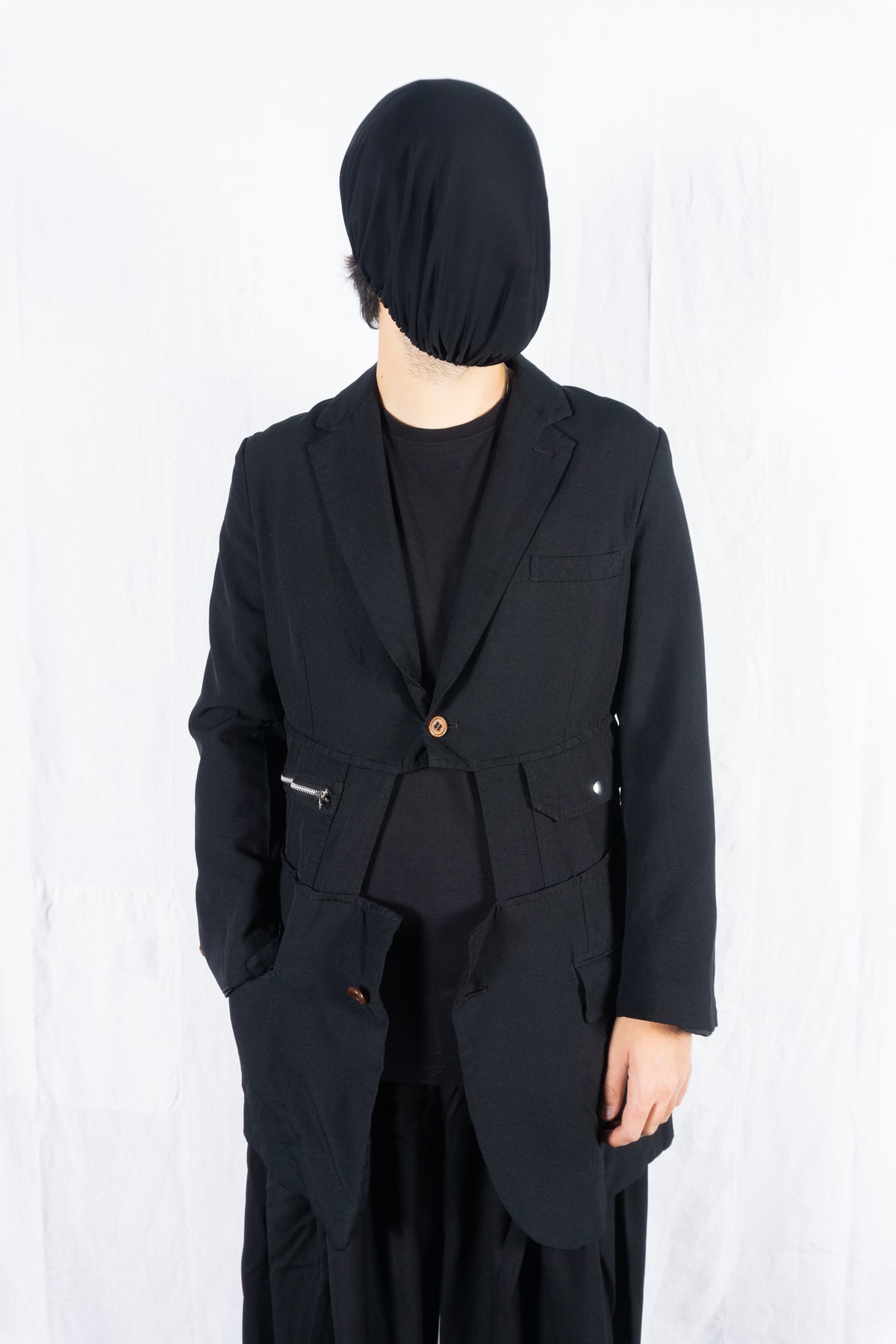 Comme des Garçons Homme Plus S/S 2020 long deconstructed jacket – side view | Recente Studio