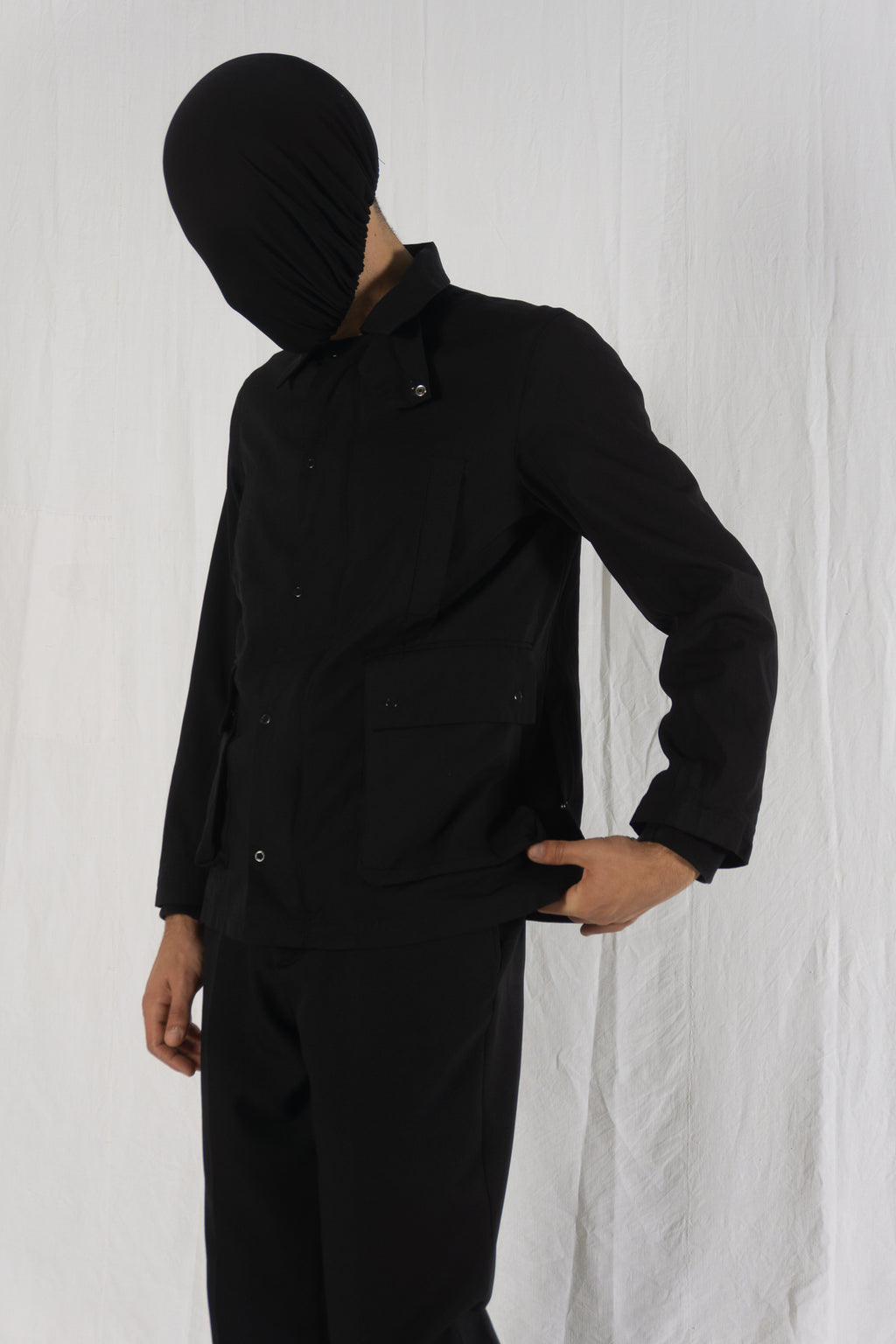 Number (N)ine Takahiro Miyashita multipocket jacket – back view | Recente Studio
