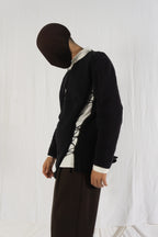 Comme des Garçons Homme Plus S/S 2022 destroyed sweater – side view | Recente Studio