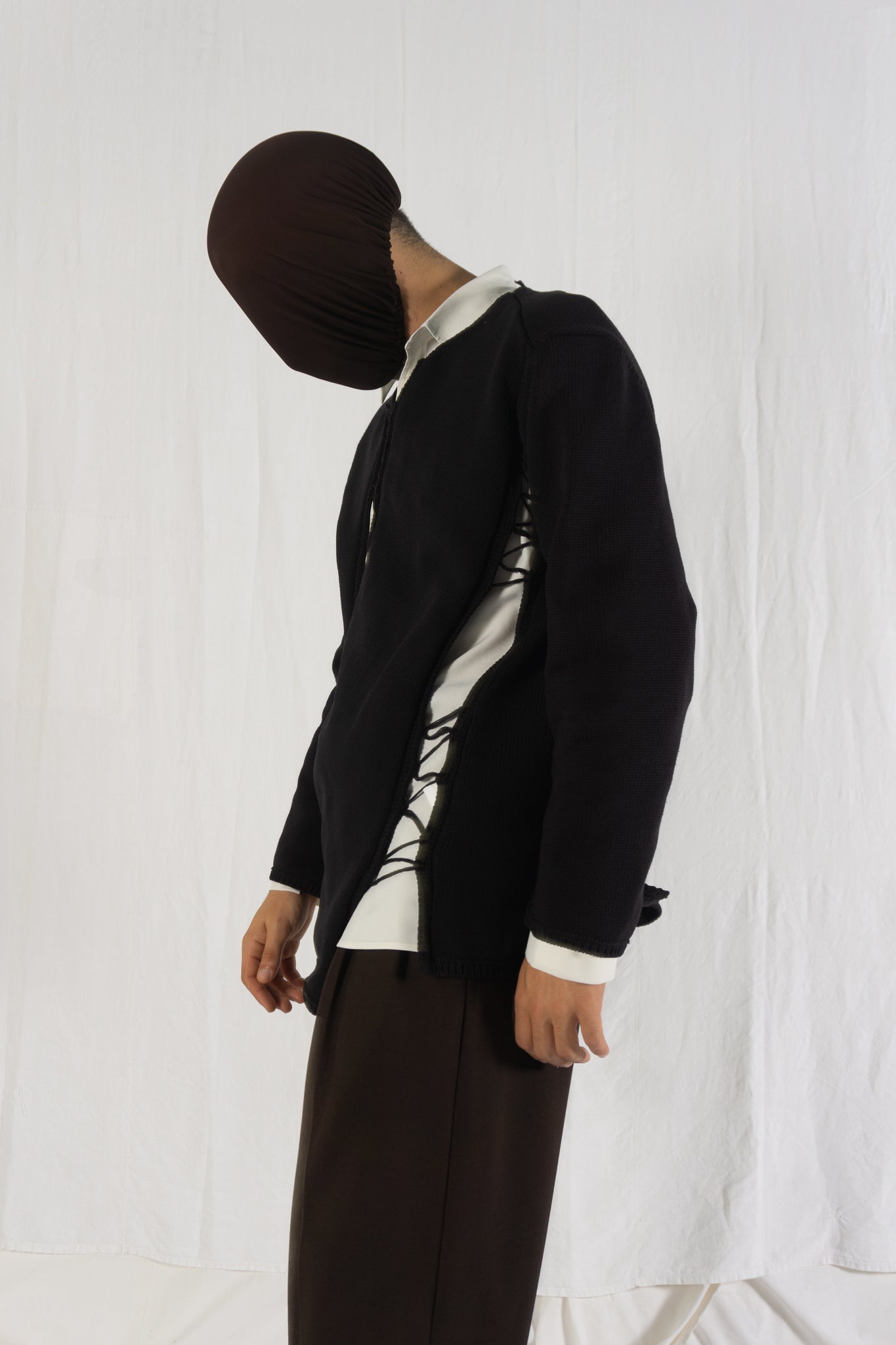 Comme des Garçons Homme Plus S/S 2022 destroyed sweater – side view | Recente Studio