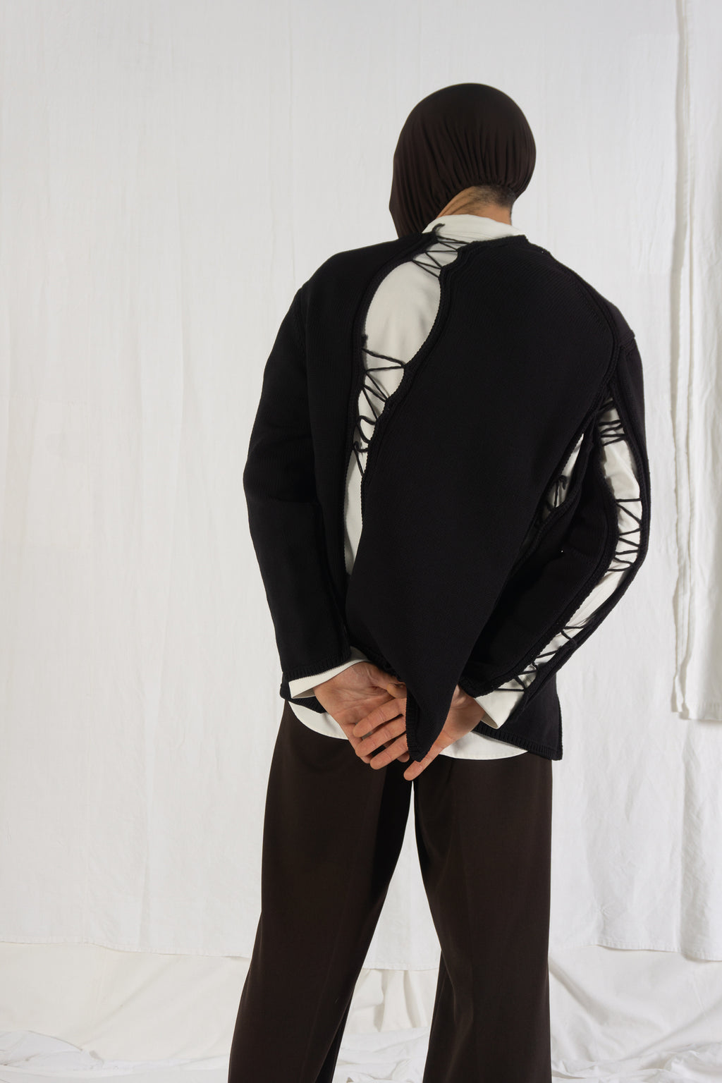 Comme des Garçons Homme Plus SS22 destroyed sweater – back view | Recente Studio