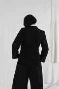 Comme des Garçons A/W 1992 asymmetric back jacket – front view | Recente Studio