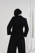 Comme des Garçons A/W 1992 asymmetric back jacket – front view | Recente Studio