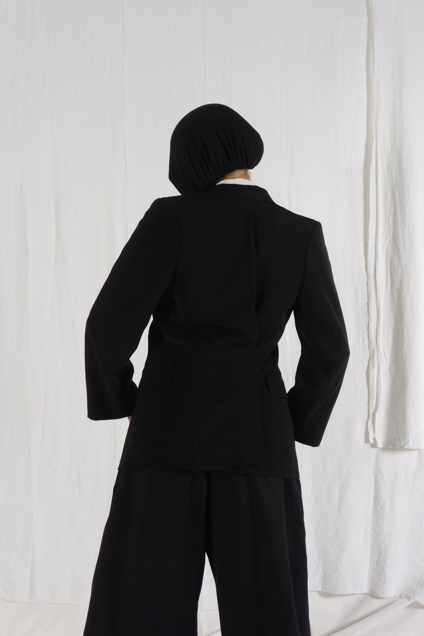 Comme des Garçons A/W 1992 asymmetric back jacket – front view | Recente Studio