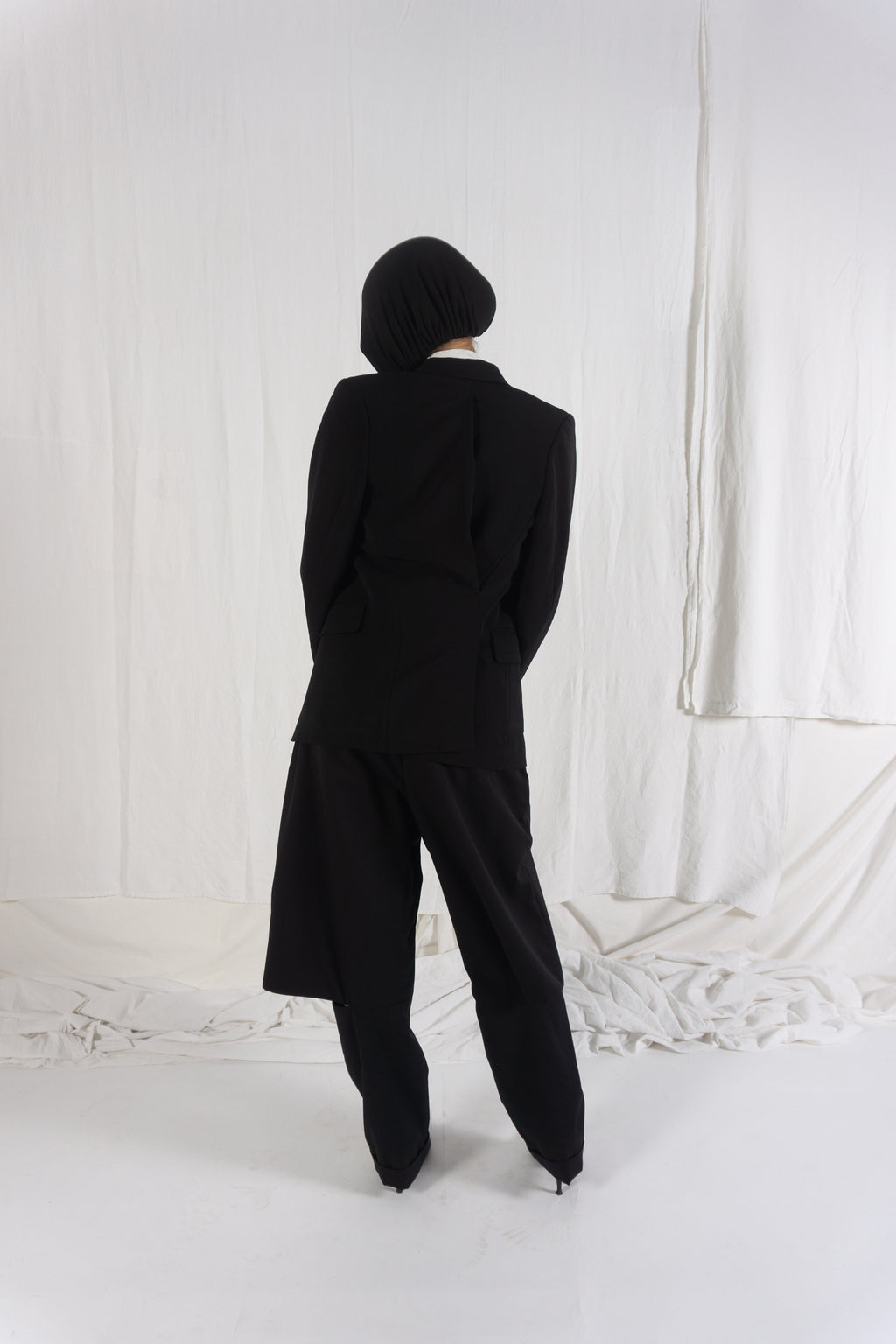 Comme des Garçons A/W 1992 asymmetric back jacket – side view | Recente Studio