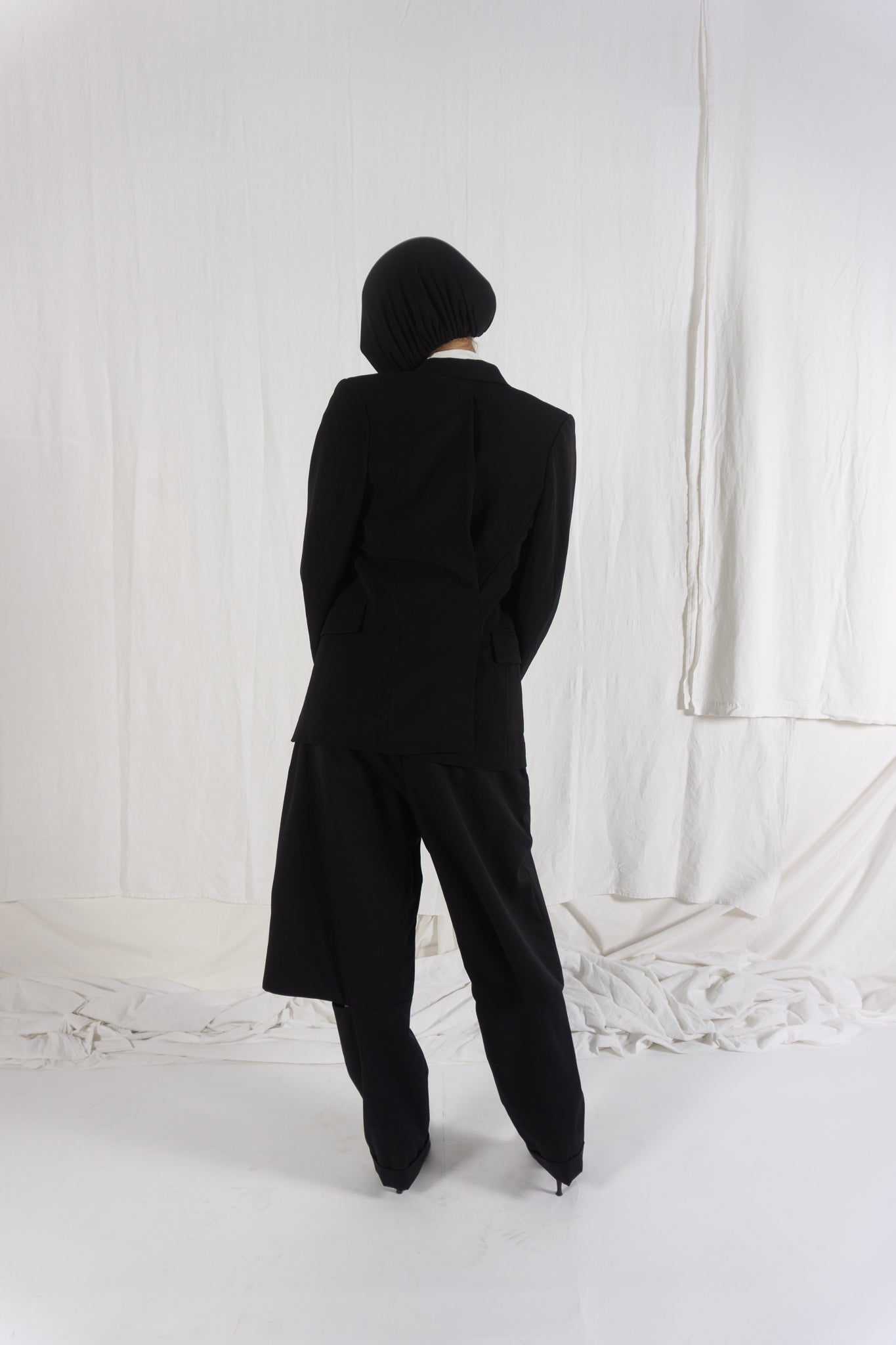 Comme des Garçons A/W 1992 asymmetric back jacket – side view | Recente Studio