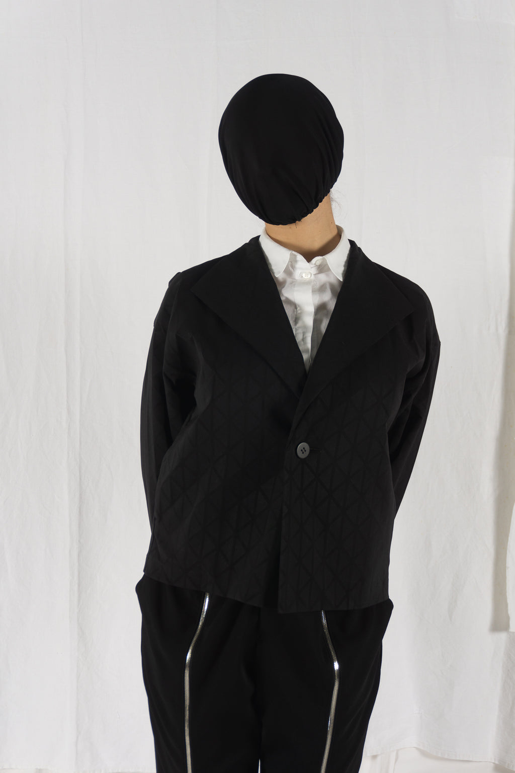 Issey Miyake A/W 2019 triangle jacket – side view | Recente Studio
