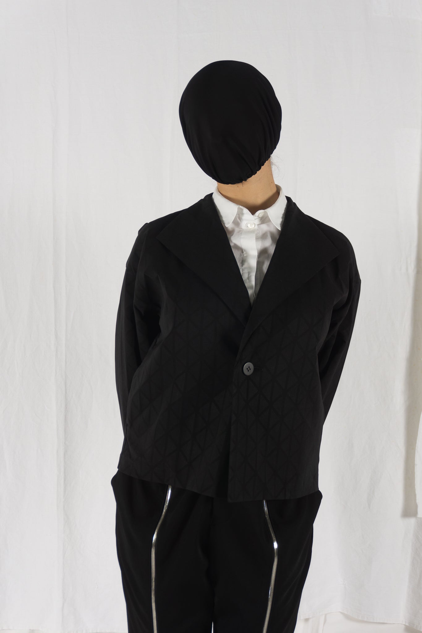 Issey Miyake A/W 2019 triangle jacket – side view | Recente Studio