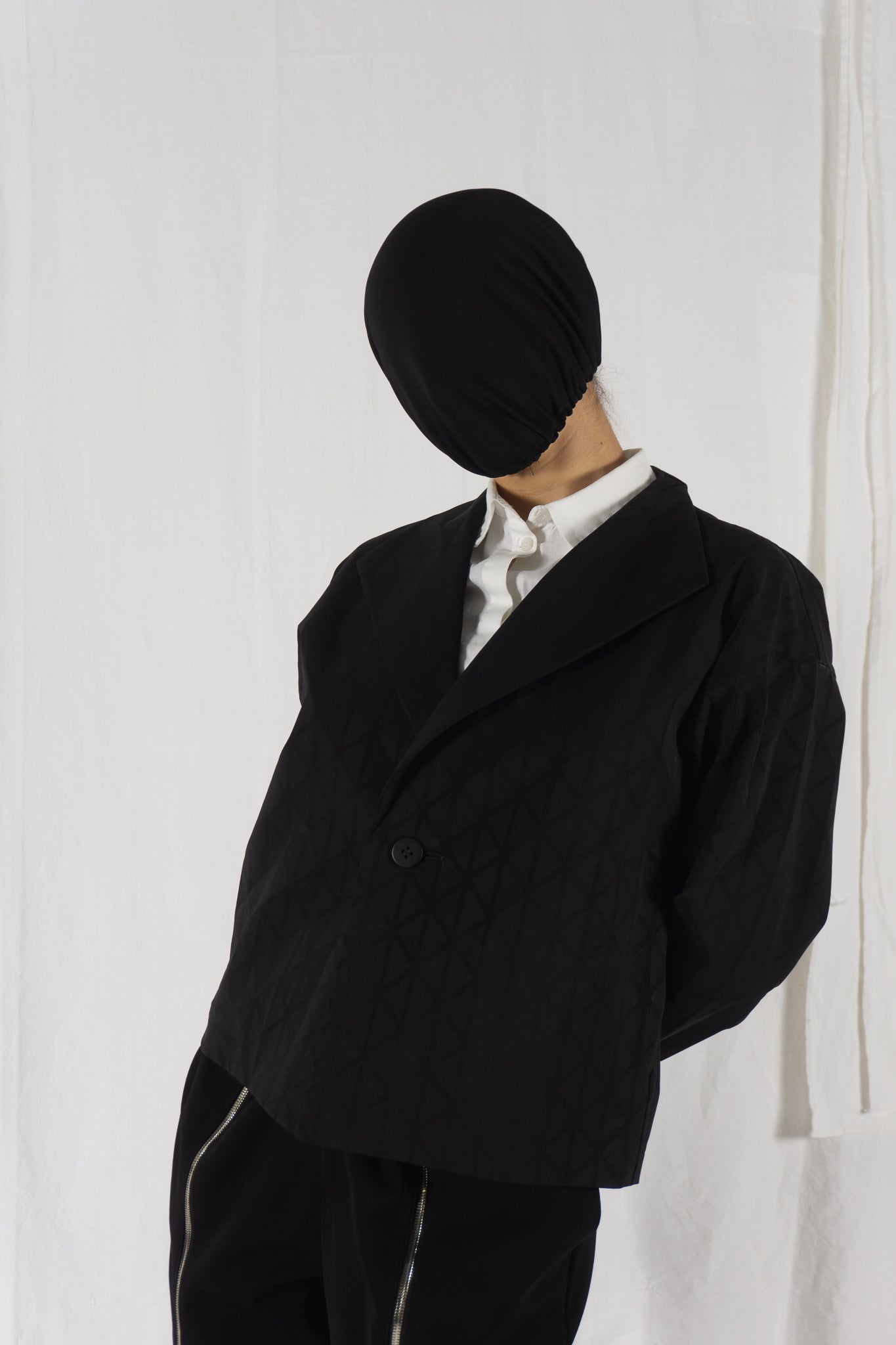 Issey Miyake AW19 triangle jacket – detail view | Recente Studio