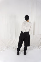 Noir Kei Ninomiya AW23 cut pants – back view | Recente Studio