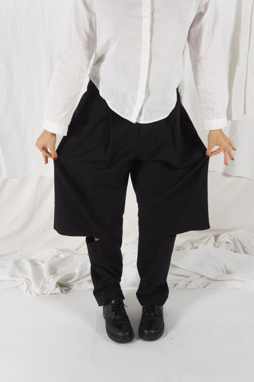 Noir Kei Ninomiya A/W 2023 cut pants – side view | Recente Studio