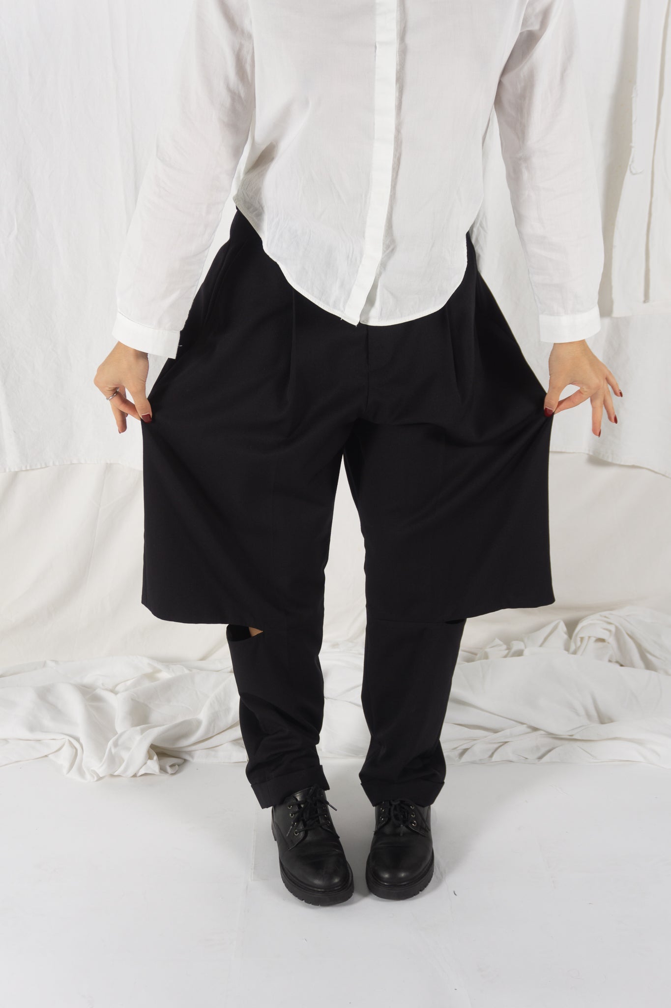 Noir Kei Ninomiya A/W 2023 cut pants – side view | Recente Studio