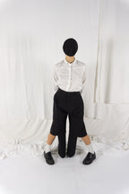 Noir Kei Ninomiya A/W 2023 cut pants – front view | Recente Studio