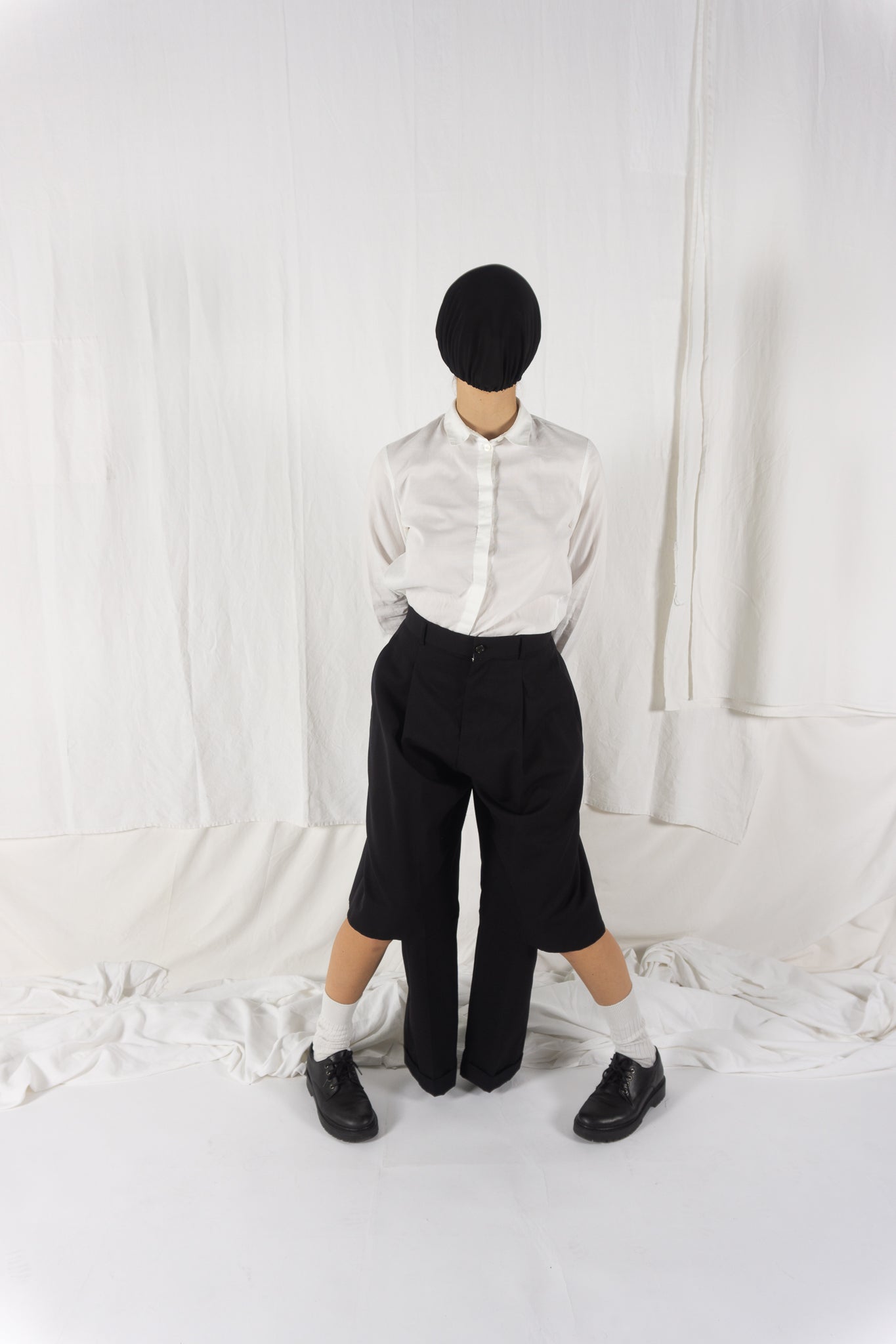 Noir Kei Ninomiya A/W 2023 cut pants – front view | Recente Studio