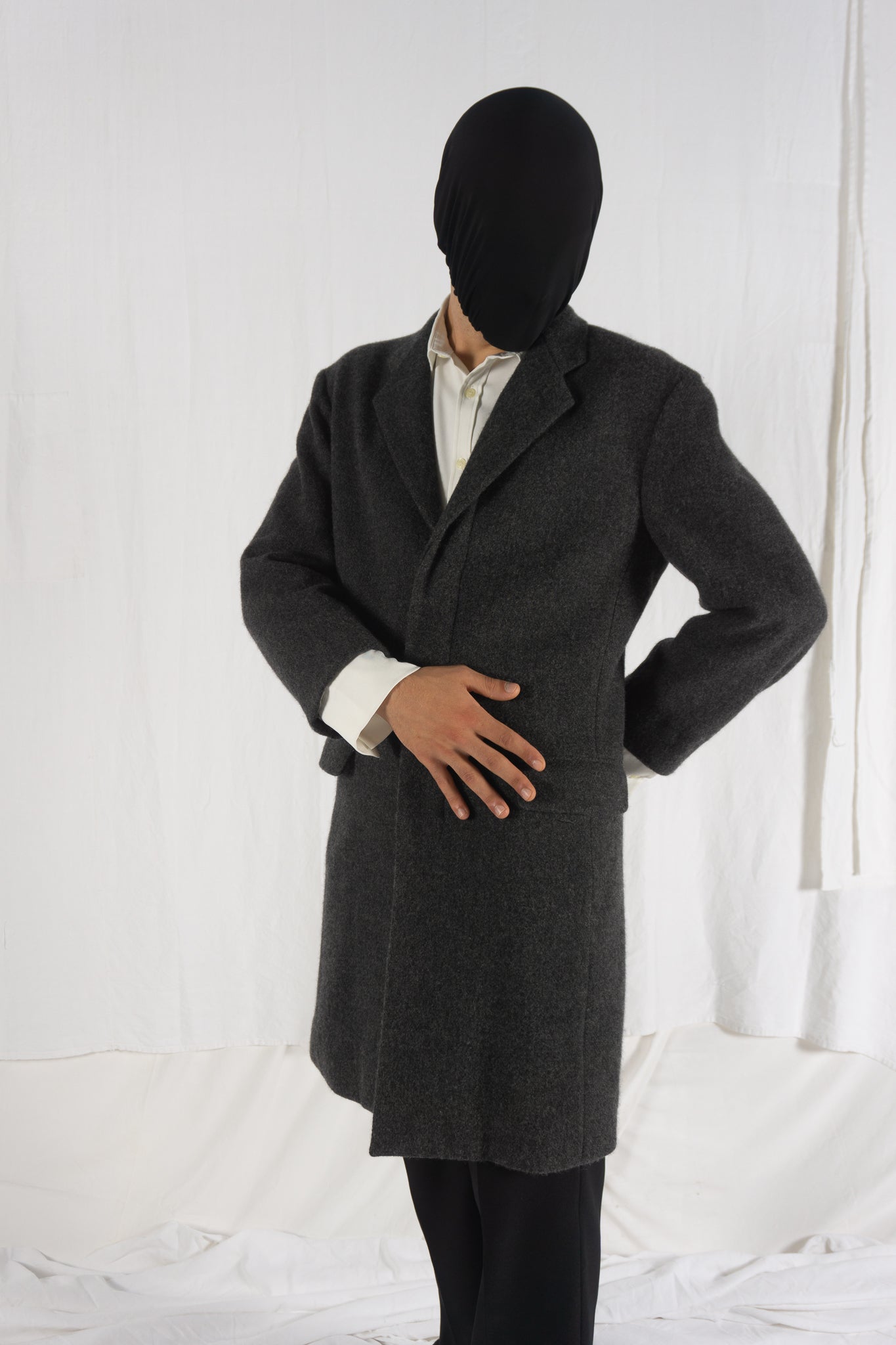Issey Miyake Men AW21 boiled wool coat – detail view | Recente Studio