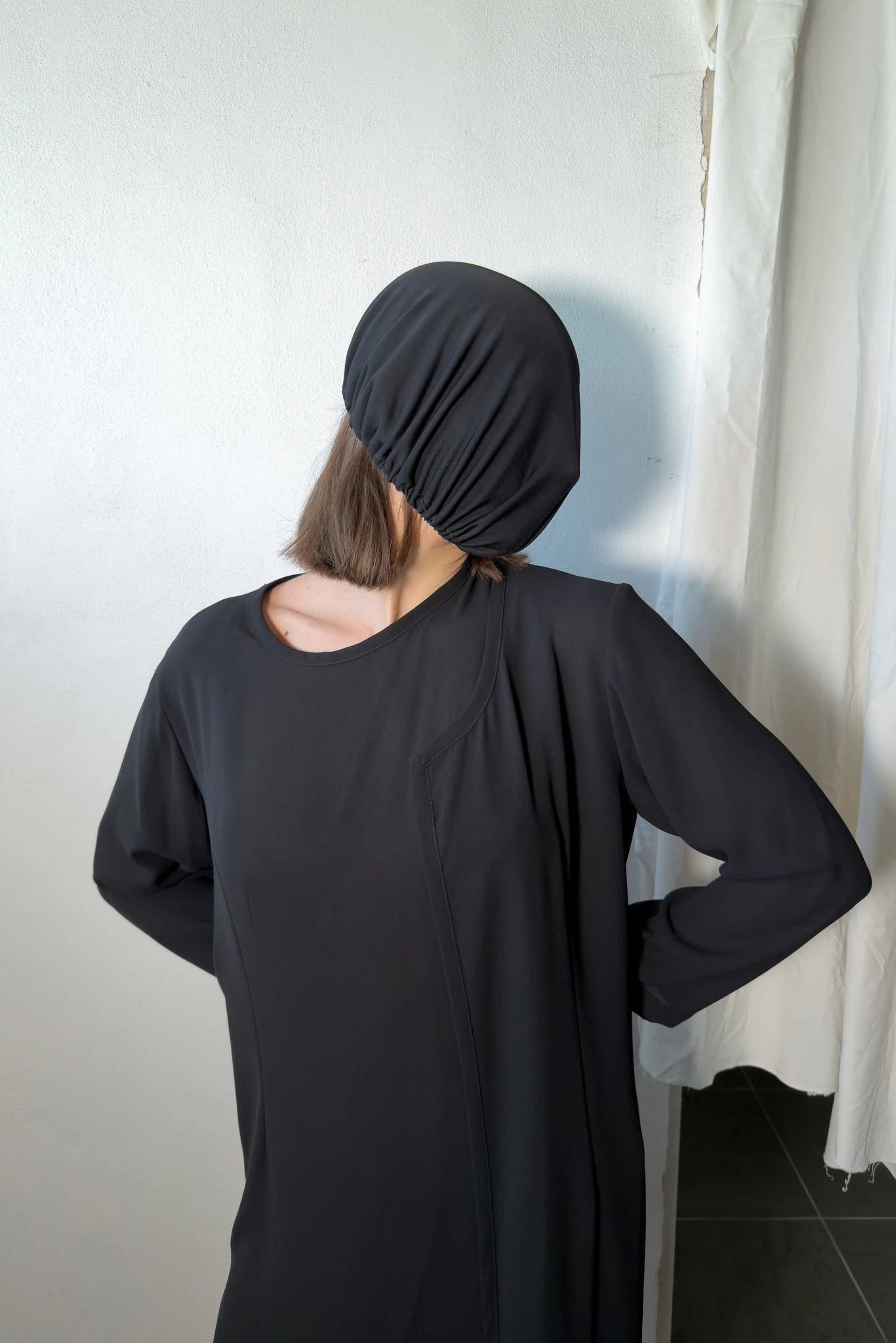 Comme des Garçons A/W 1991 asymmetrical dress – side view | Recente Studio