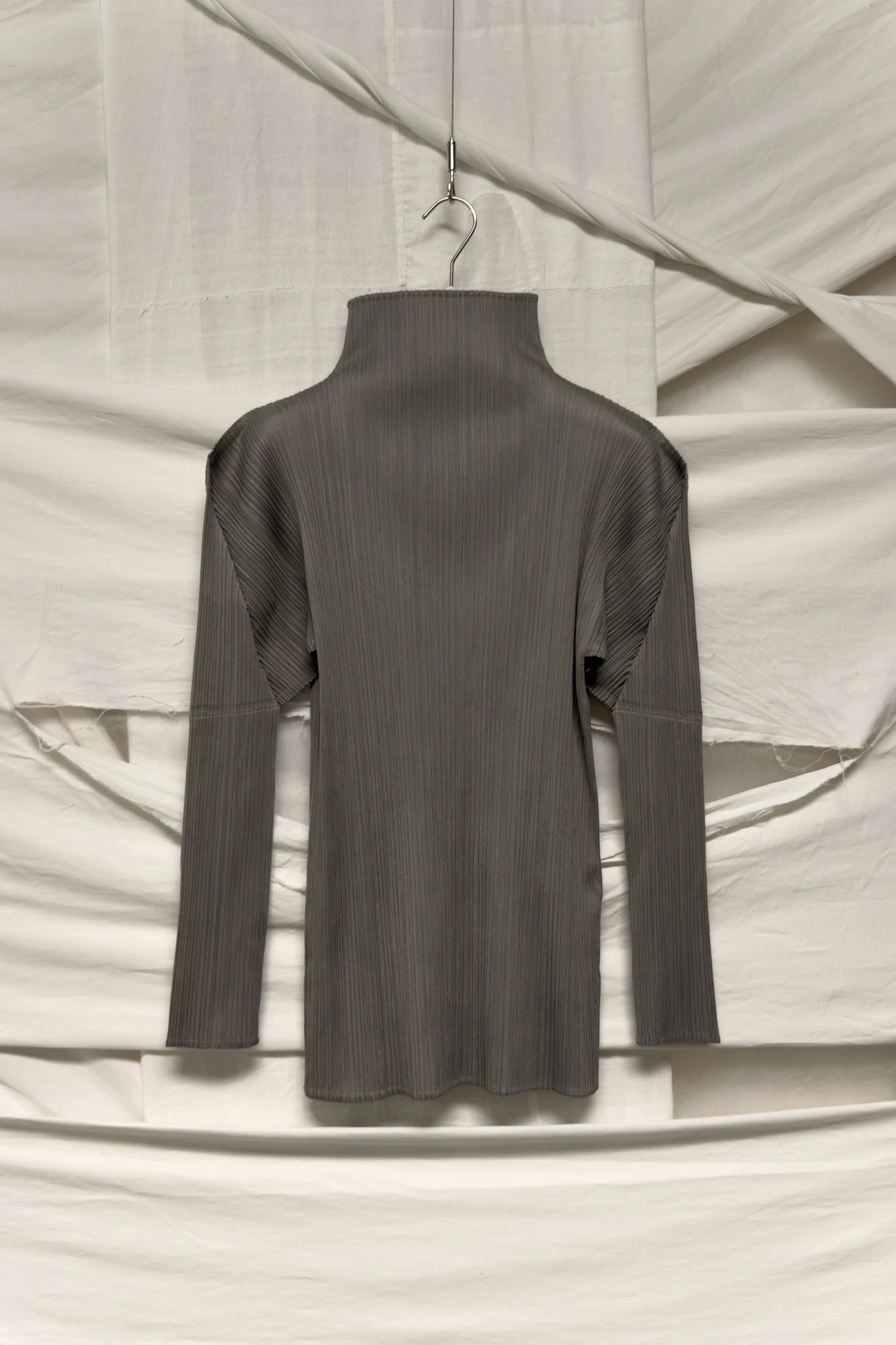 Issey Miyake Pleats Please top – garment on hanger | Recente Studio