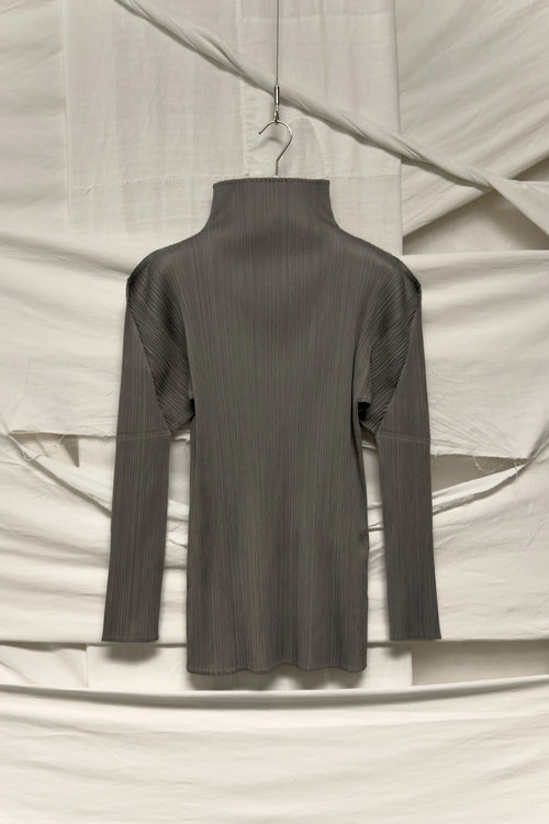 Issey Miyake Pleats Please top – garment on hanger | Recente Studio
