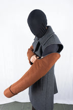 Comme des Garçons Homme Plus AW22 sculpted peacoat – three-quarter view | Recente Studio