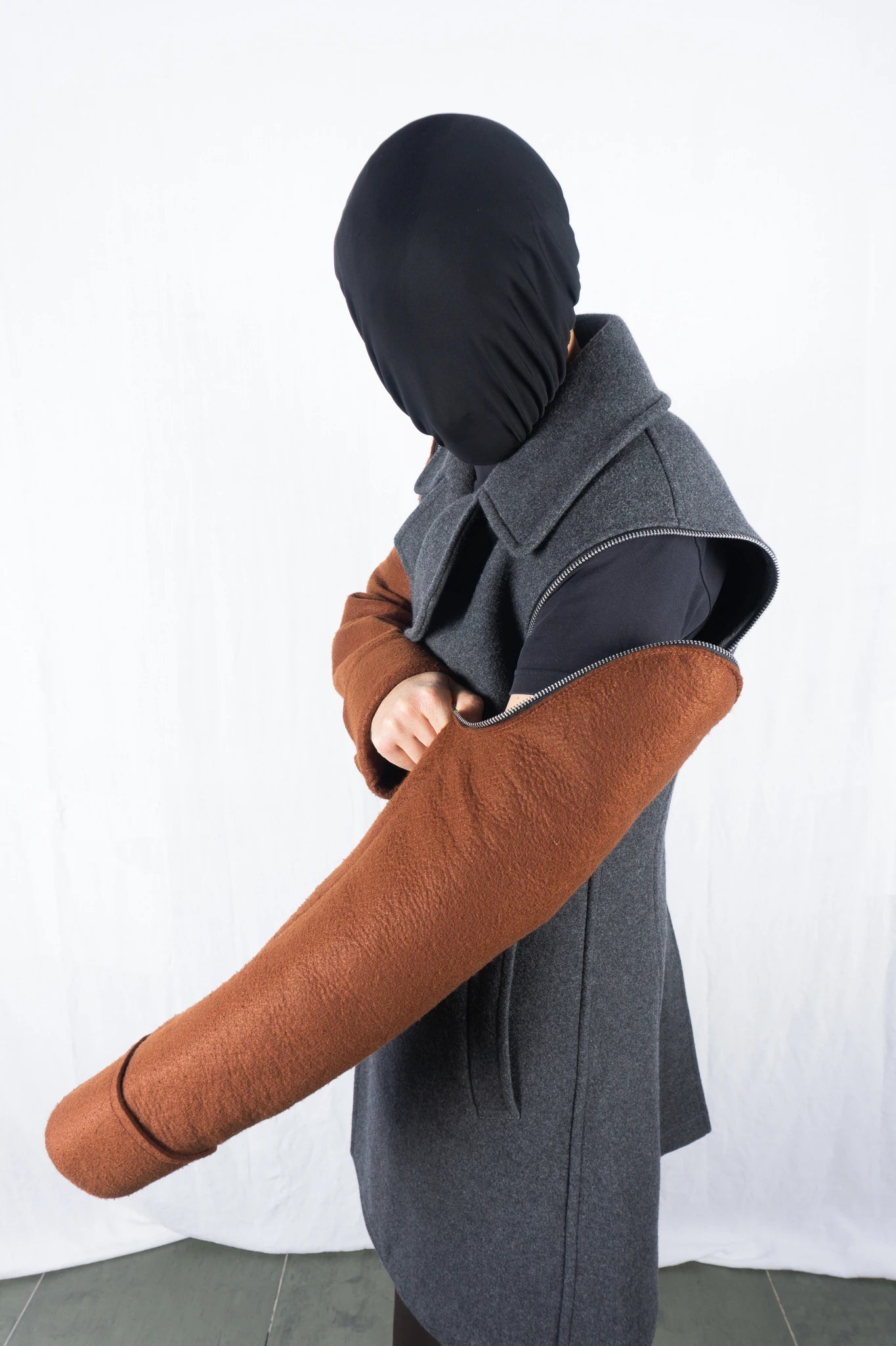 Comme des Garçons Homme Plus AW22 sculpted peacoat – three-quarter view | Recente Studio