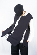 Comme des Garçons Homme Plus S/S 2022 asymmetrical sleeveless sweater – front view | Recente Studio